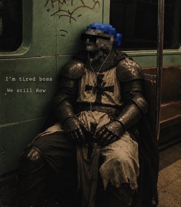 A person in medieval armor with a blue helmet and white tunic marked with a cross sits slumped in a subway car, with text overlay reading "I'm tired boss / We still Row."