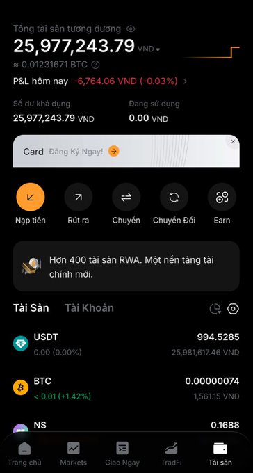 A cryptocurrency wallet app screenshot in Vietnamese showing a total balance of 25,977,243.79 VND (~0.01231671 BTC) with holdings in USDT and BTC.