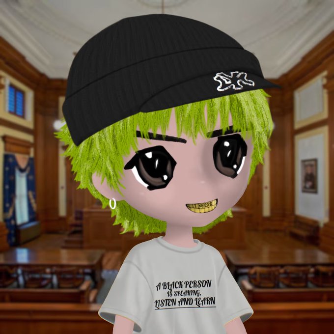 A 3D anime-style avatar with green hair and a black beanie wears a shirt reading "A BLACK PERSON IS SPEAKING, LISTEN AND LEARN" in a wood-paneled courtroom setting.