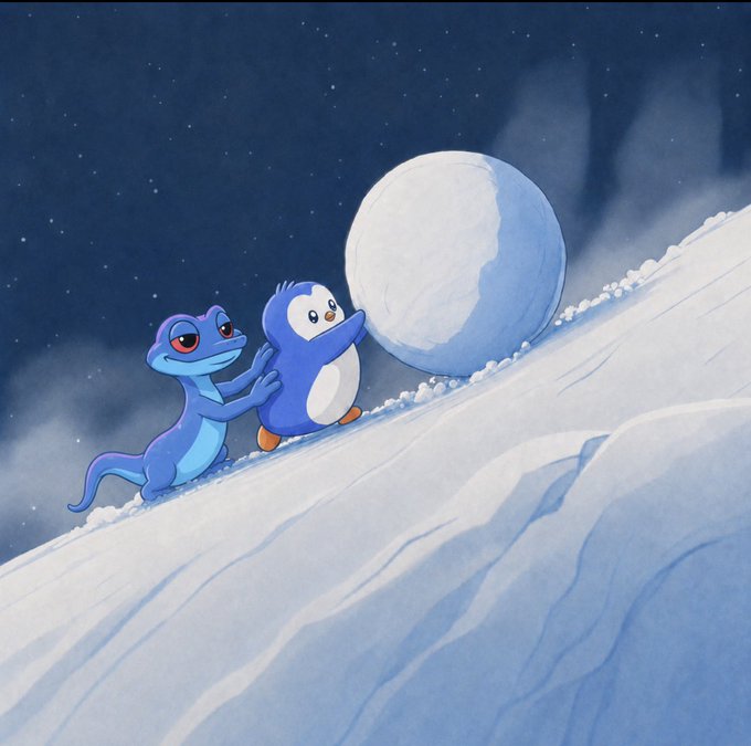 A blue lizard and a penguin work together to push a giant snowball up a snowy hill under a starry night sky. The collaborative effort mirrors the post's theme of teamwork and perseverance, encouraging followers to stay united in pushing "$SNEK" forward together.