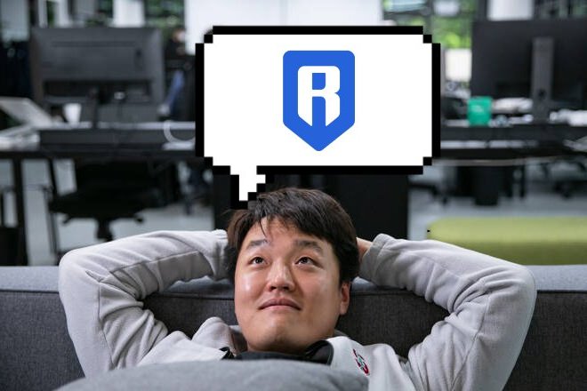 The image features an Asian man lying down on a couch with his arms crossed, wearing a gray sweatshirt. The man has a thought bubble above him that says "RON HOLDER". This thought bubble seems to be related to the concept of Proof of Distribution and how it can reward holders for their participation in projects or games by staking tokens. It also suggests that holders should get a cut of the rewards allocated to them, which is an important aspect of Proof of Distribution systems. The image does not provide any additional information about the content of the post or its context.