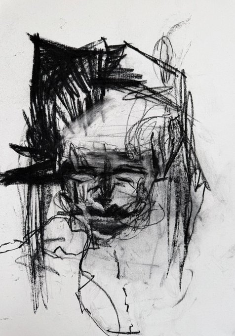 An expressive charcoal sketch depicting a rough, abstract portrait of a person with dark, scribbled hair and facial features.