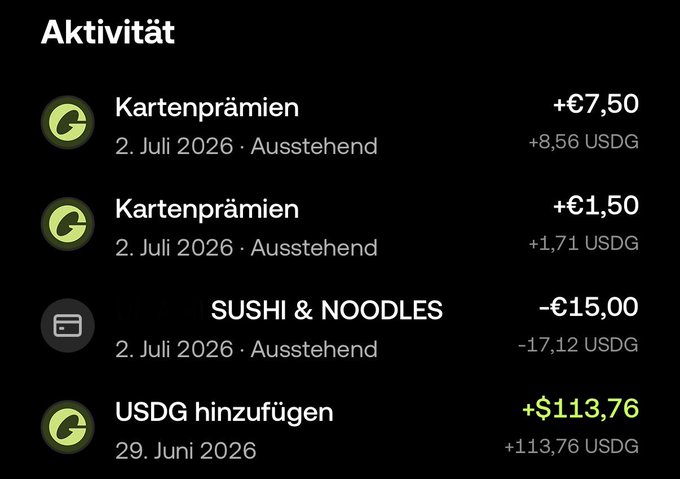 A German-language "Aktivität" (Activity) transaction list showing pending and completed transactions including card rewards (Kartenprämien) of +€7.50 and +€1.50, a -€15.00 charge from "SUSHI & NOODLES", and a +$113.76 USDG deposit dated 29. Juni 2026, with corresponding USDG amounts listed for each entry.