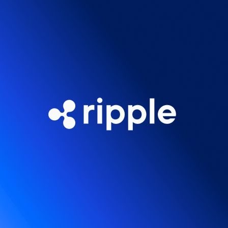 The image displays the white Ripple logo and "ripple" wordmark centered against a deep blue gradient background, visually reinforcing the post's announcement about Ripple's AI-powered gSMART tool expansion within Ripple Treasury.