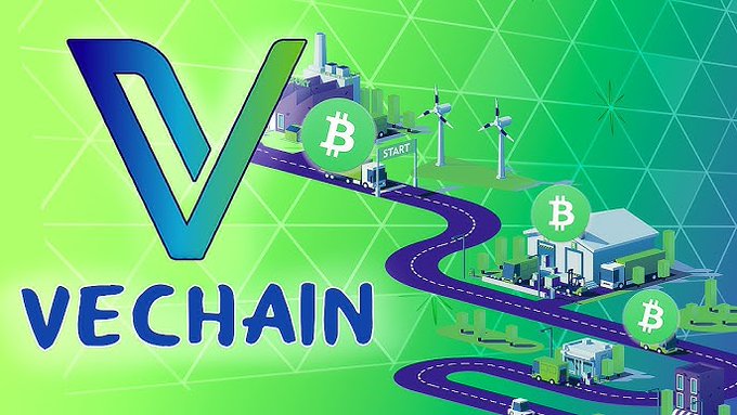 Promotional graphic for VeChain featuring its blue and green logo alongside Bitcoin symbols and an illustration of wind turbines, factories, and delivery trucks on a winding road.