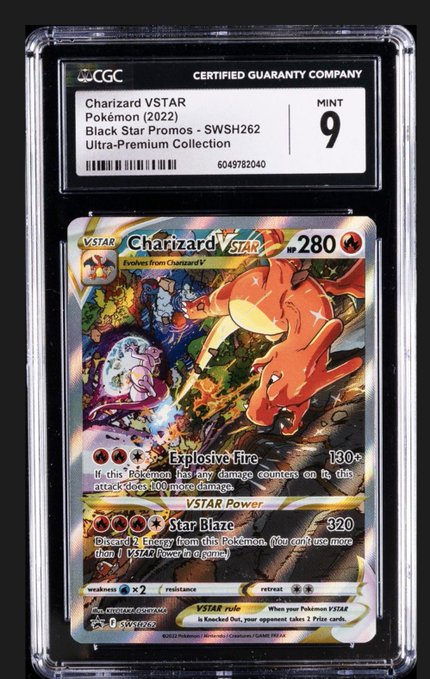 A CGC-graded (Mint 9) Charizard VSTAR Pokémon card from the Black Star Promos set (SWSH262), part of the Ultra-Premium Collection, featuring the attacks Explosive Fire and Star Blaze.