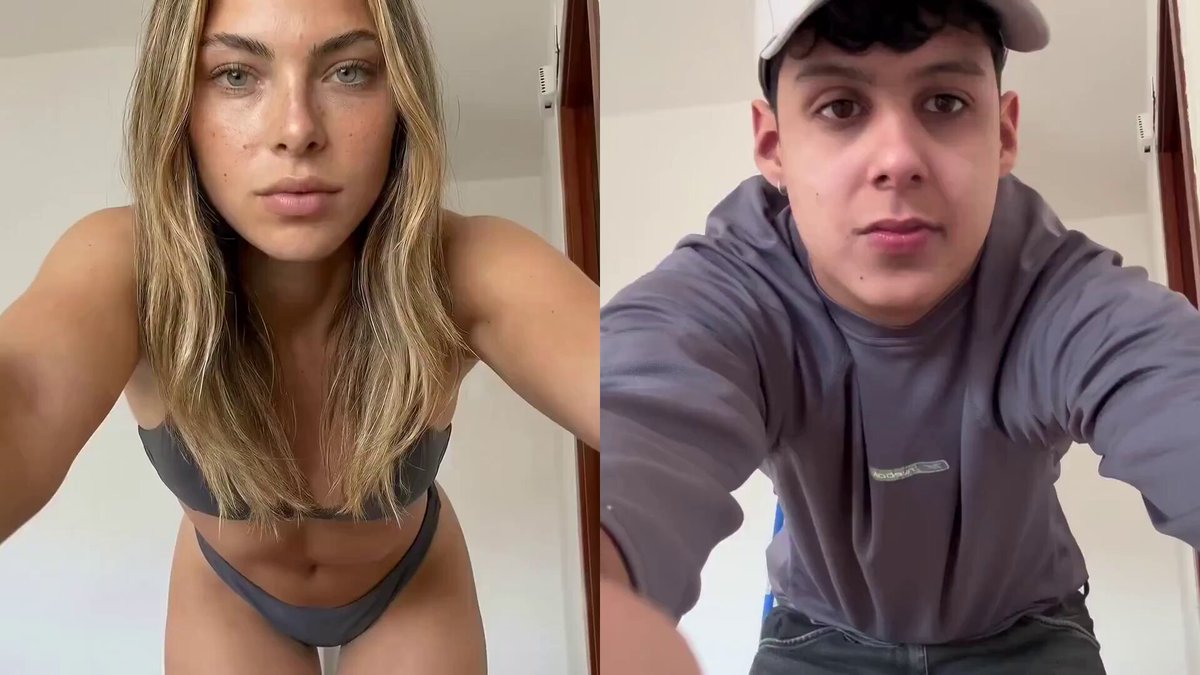 The image shows a split screen of two people posing for a photo. The left side features a blonde woman wearing a bikini top and shorts, while the right side displays a man dressed in a gray sweatshirt with his arms outstretched. Both individuals are looking directly at the camera, creating an interesting contrast between their outfits and poses.