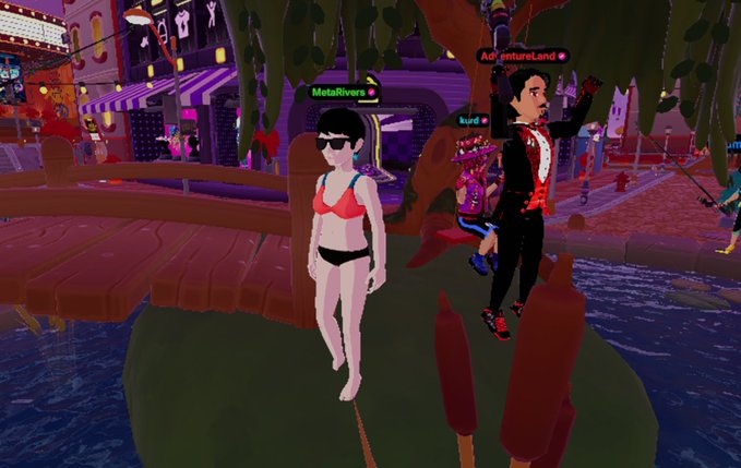 A screenshot from a virtual world/metaverse platform showing avatars in a cartoonish town setting, including a woman in a bikini and a man in a red outfit, with usernames like 'MetalRivers', 'kuni', and 'An_enturoLand' floating above characters.