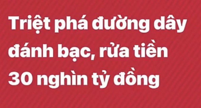 A red banner with white Vietnamese text reading "Triệt phá đường dây đánh bạc, rửa tiền 30 nghìn tỷ đồng" (translating to "Dismantling a gambling and money laundering ring worth 30 trillion VND"), corresponding to the post about a massive crypto-related money laundering operation that led to over 2,000 bank accounts being frozen across 36 banks with balances exceeding 3,000 billion VND.