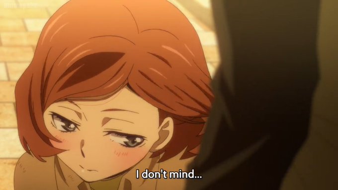 An anime character with short auburn hair blushes while looking up, with the subtitle "I don't mind..." displayed at the bottom.