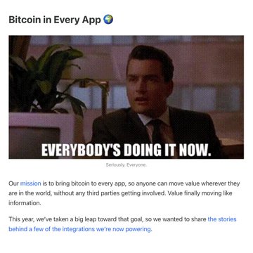 The image features a banner advertisement for Bitcoin In Every App that shows a man sitting down at a desk. The caption below the photo reads, "Our mission is to bring Bitcoin to everyone's app". A screenshot of the message confirms this claim by showing the same text displayed on the advertisement.