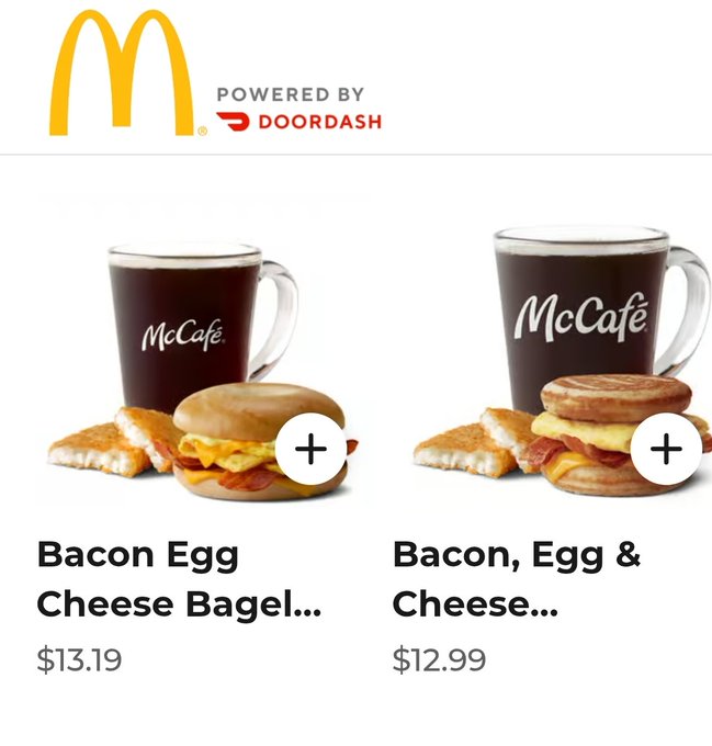 A McDonald's menu page powered by DoorDash showing two McCafé breakfast options: a Bacon Egg Cheese Bagel for $13.19 and a Bacon, Egg & Cheese sandwich for $12.99.