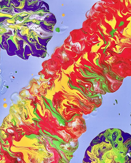Abstract acrylic pour painting with swirling patterns of red, yellow, green, purple, and white against a light blue background.