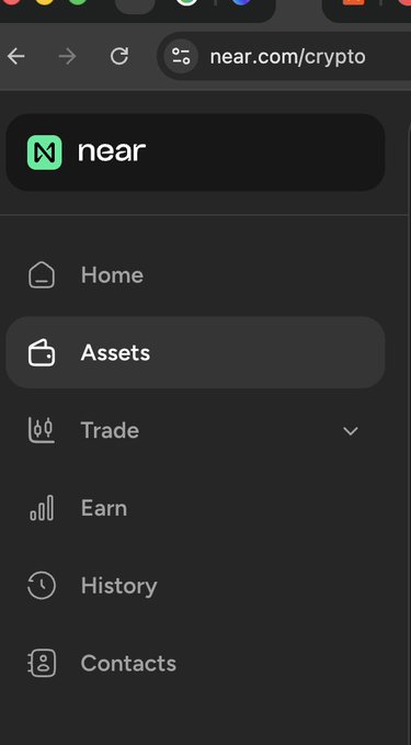 A mobile browser screenshot of near.com/crypto showing a navigation menu with options for Home, Assets (highlighted), Trade, Earn, History, and Contacts.