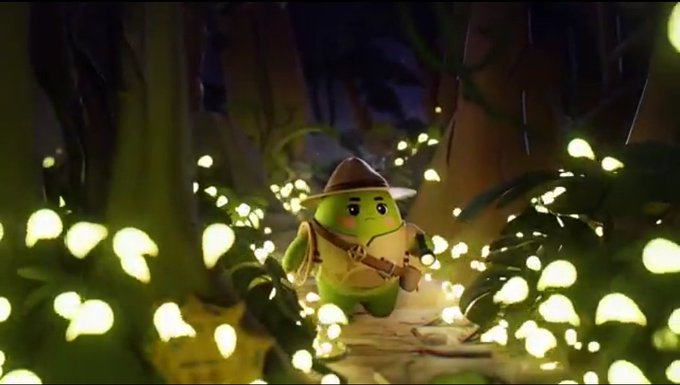 The image features a small cartoon green frog with a hat walking through a forest at night, illuminated by several lights in various shapes and sizes around him. A line of small white lights is visible behind the frog, creating an enchanting atmosphere. The scene seems to be from a video game or animated movie as it conveys a sense of adventure and exploration.