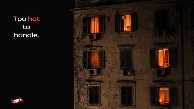 Tabasco sauce advertisement reading 'Too hot to handle,' featuring a dimly lit building facade with windows glowing orange against a black night sky.