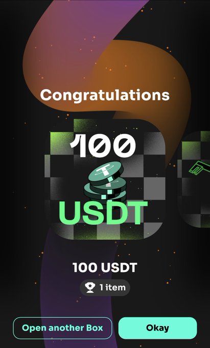 A congratulatory screen showing a 100 USDT win from a "GGBOX" mystery box, which relates to the user's post about opening the box to console themselves after their favorite Portugal and Germany's elimination.