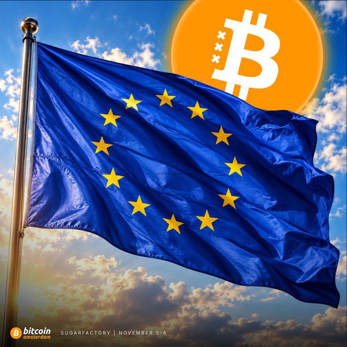 A promotional poster for 'Bitcoin Amsterdam' at SugarFactory on November 5-6, featuring the EU flag waving against a cloudy sky with a Bitcoin logo in the background.