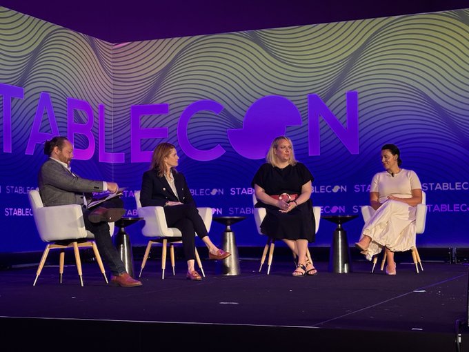 A panel discussion at a STABLECON conference with four participants seated on stage in front of a large 'STABLECON' backdrop.