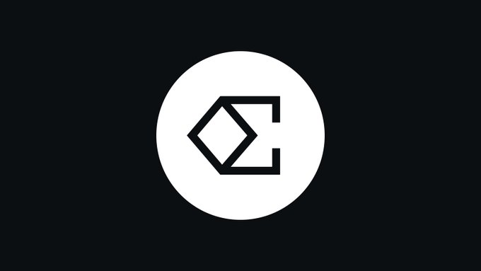 A logo featuring a stylized letter 'C' within a white circle on a dark gray background.