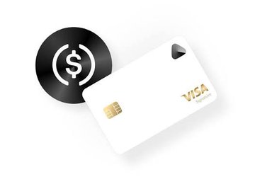 A white Visa debit/credit card with a gold chip displayed next to a black circular icon containing a dollar sign and signal waves, suggesting mobile or digital payments.