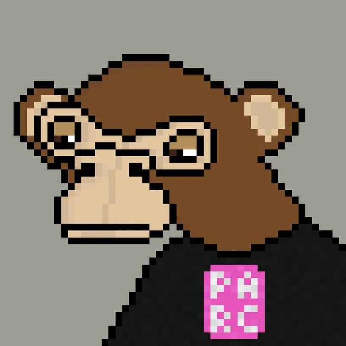A pixel art portrait of a monkey wearing a black shirt with a pink 'PARC' logo badge.