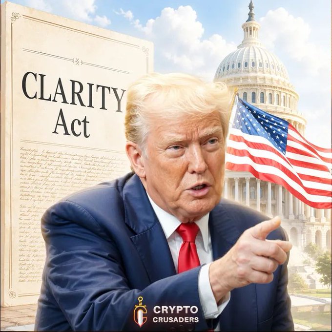 The image features a man dressed in a suit, standing in front of a large document that reads "CLARITY ACT". The man appears to be pointing at something or making a gesture related to the text displayed on the document. In the background, there is an American flag flying high above the Capitol building. The caption below the image states that President Trump supports the clarity act and wants big banks to stop supporting it.