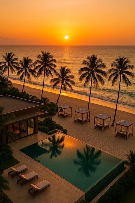 A serene tropical beach scene at sunset with palm trees, a luxury villa featuring an infinity pool in the foreground, and small cabanas along the golden sandy shore.
