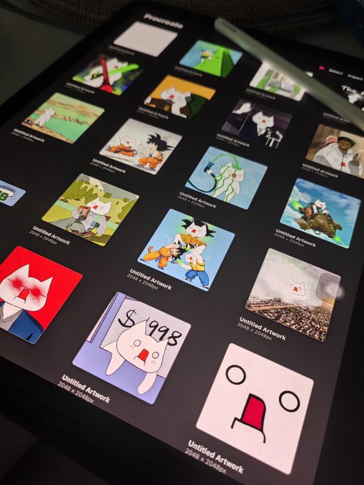A tablet screen displaying the Procreate app's gallery view, featuring various digital artworks with titles like 'Untitled Artwork' and dimensions listed in pixels, including a piece marked '2048 x 2048px' showing a crying cat holding a '$998' sign.