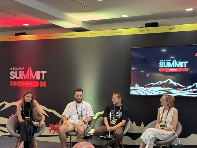 Four panelists sit on stage at the "Solana Summit Serbia" event, with the summit's branded backdrop and screen visible behind them, showcasing the polished marketing presentation highlighted in the accompanying post.