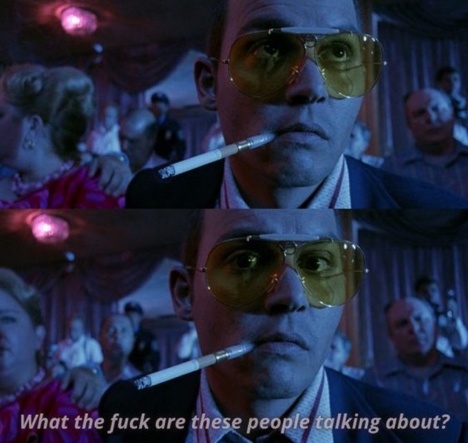 A man in yellow aviator sunglasses smokes a cigarette while giving a bewildered sideways glance at a nearby group of people, with the caption "What the fuck are these people talking about?" — capturing his confusion at overhearing conversations, fitting a post about waiting to buy a market dip.