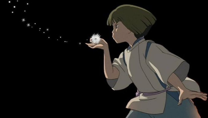 An animated illustration of a young character in traditional Japanese-style clothing holding a glowing crystal that emits sparkling particles against a black background.