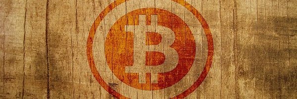 The same Bitcoin logo painted in orange on a weathered wooden background.