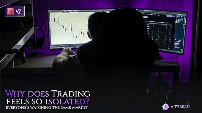 A person sits at a computer monitoring trading charts and financial data; the overlay reads “WHY DOES TRADING FEELS SO ISOLATED?” and “EVERYONE’S WATCHING THE SAME MARKET.”