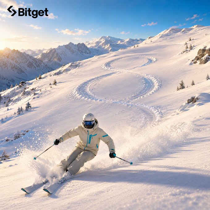 A skier carves dynamic S-shaped tracks down a sunlit mountain slope, embodying the post's message of momentum and perseverance. The "Bitget" logo appears in the top-left corner, reinforcing the brand's encouragement to its community to keep pushing forward.