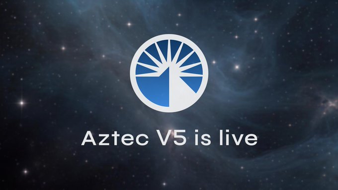 A stylized logo featuring a blue and white sunburst design appears against a cosmic starfield background, with the text "Aztec V5 is live" prominently displayed below it, announcing the release of the Aztec network's latest privacy-focused version that Azguard wallet has integrated support for.