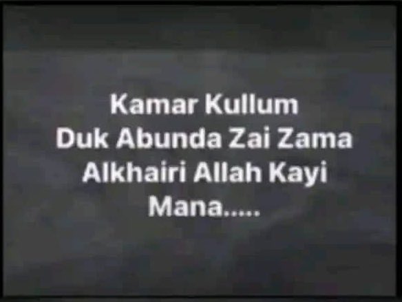 A dark textured background displaying white text that reads 'Kamar Kullum Duk Abunda Zai Zama Alkhairi Allah Kayi Mana.....'