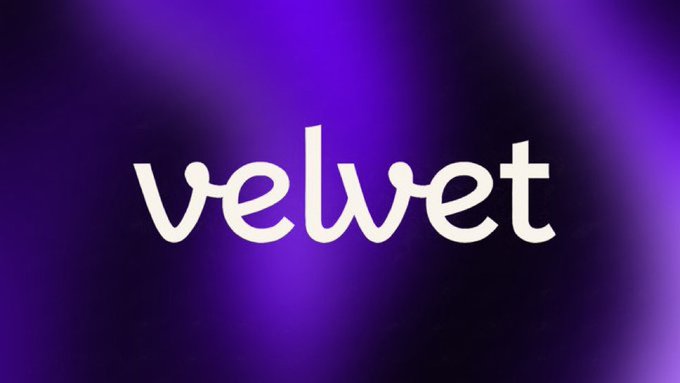 A dark image with a blurred purple gradient background displaying the white lowercase text 'velwet' in the center.