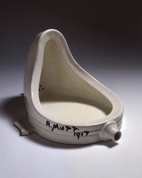 A white ceramic sculpture by R. Mutt from 1917, a famous Dadaist piece resembling a urinal.