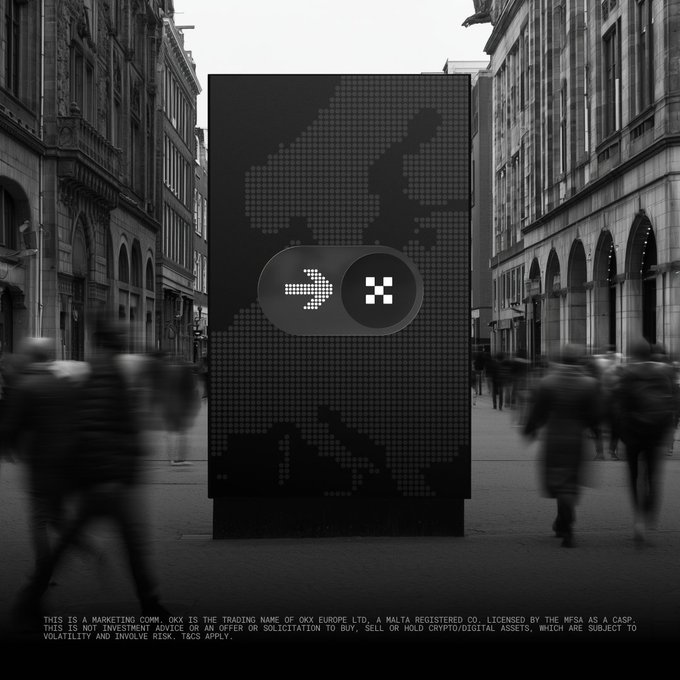A black billboard with the OKX logo stands in a grayscale European street, with blurred pedestrians walking past. The fine print below references OKX Europe Ltd.'s Malta registration and MiCA license through the MFSA, visually reinforcing the company's newly approved regulatory status in Europe.