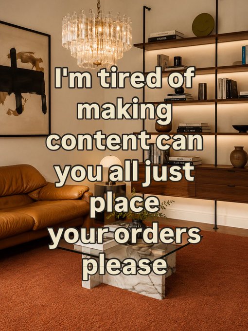 An interior design image of a living room with a brown leather sofa, glass coffee table, and chandelier, overlaid with the text 'I'm tired of making content can you all just place your orders please'.