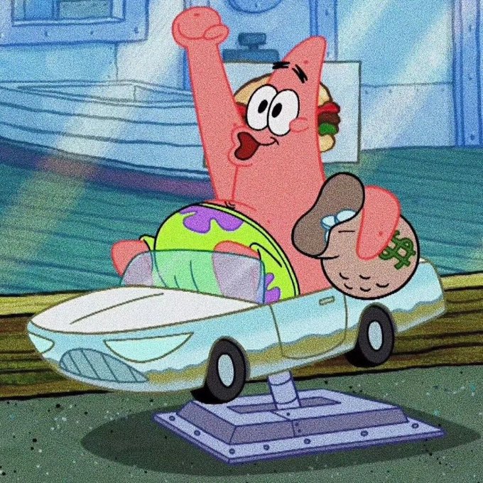 Patrick Star from SpongeBob SquarePants riding a car-shaped playground ride with his fist raised in excitement.