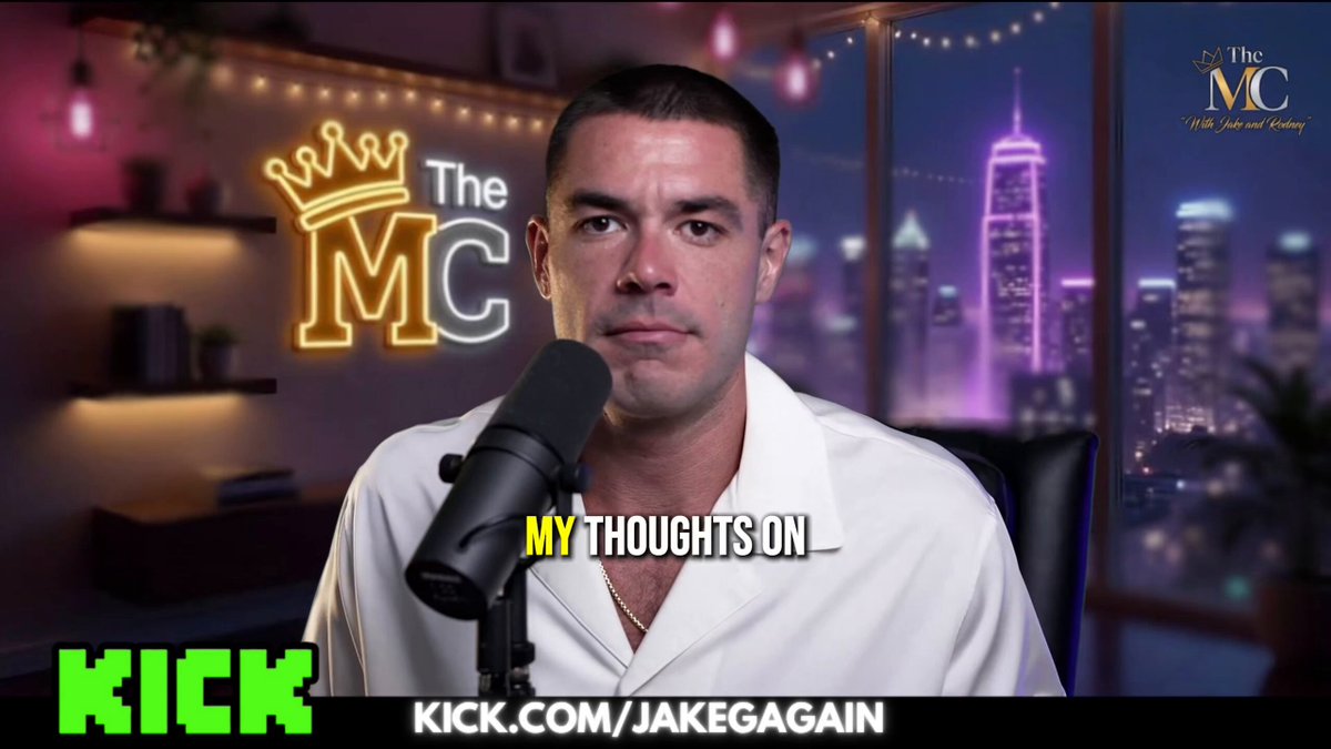 A man wearing a white shirt is speaking into a microphone while sitting in front of a city skyline, with neon lights illuminating the scene. The title of his podcast is "The M.C." which appears to be a discussion about his thoughts on buying a particular stock at $2.
