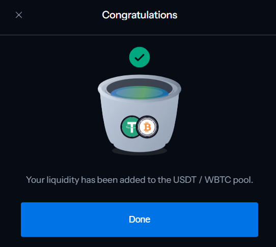 A 'Congratulations' pop-up screen from a crypto platform confirming that liquidity has been successfully added to the USDT / WBTC pool.