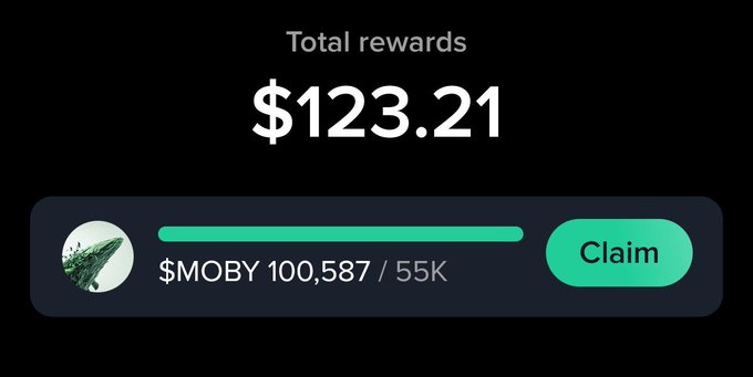 A dark digital rewards screen displays "Total rewards $123.21" with a progress bar for "$MOBY 100,587 / 55K" and a green "Claim" button.
