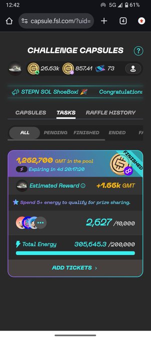 A mobile screenshot of 'CHALLENGE CAPSULES' showing 1,252,700 GMT in the pool with a +1.66k QMT estimated reward, 2,627/10,000 progress, and 305,645.3/200,000 Total Energy.