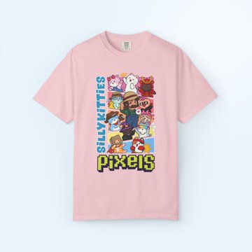 A pink t-shirt featuring a pixelated graphic of the Silly Kitties characters with the text 'SILLYKITTIES' and 'PIXELS' printed on it.