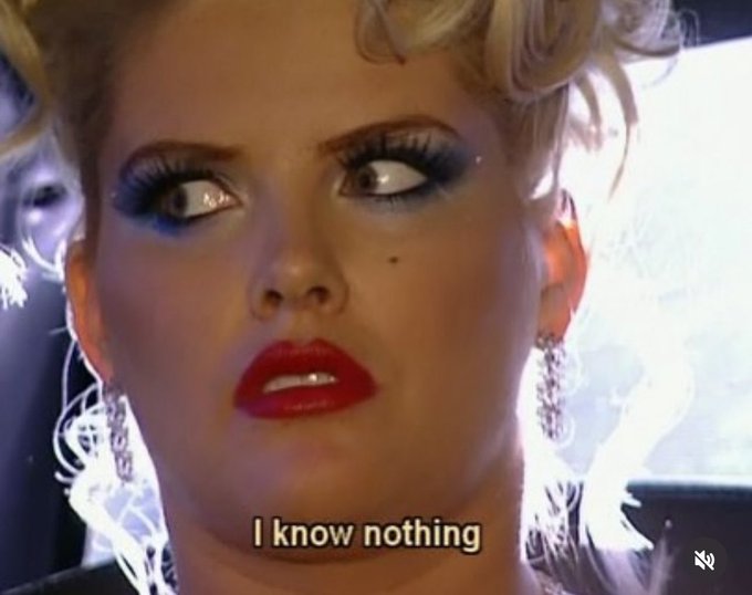 A blonde woman with bold blue eyeliner and red lipstick has a skeptical sideways glance with the caption "I know nothing," humorously reflecting skepticism toward the crypto airdrop instructions posted alongside it.
