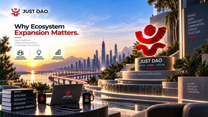 A promotional banner for 'JUST DAO' with the tagline 'BUILD · LEND · GROW', titled 'Why Ecosystem Expansion Matters,' featuring a futuristic cityscape at sunset with a red logo sculpture and a laptop displaying the brand.