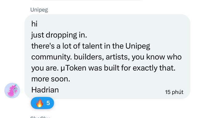 A Telegram message from Unipeg stating "hi just dropping in. there's a lot of talent in the Unipeg community. builders, artists, you know who you are. μToken was built for exactly that. more soon. Hadrian" with a fire reaction showing 5 reactions.